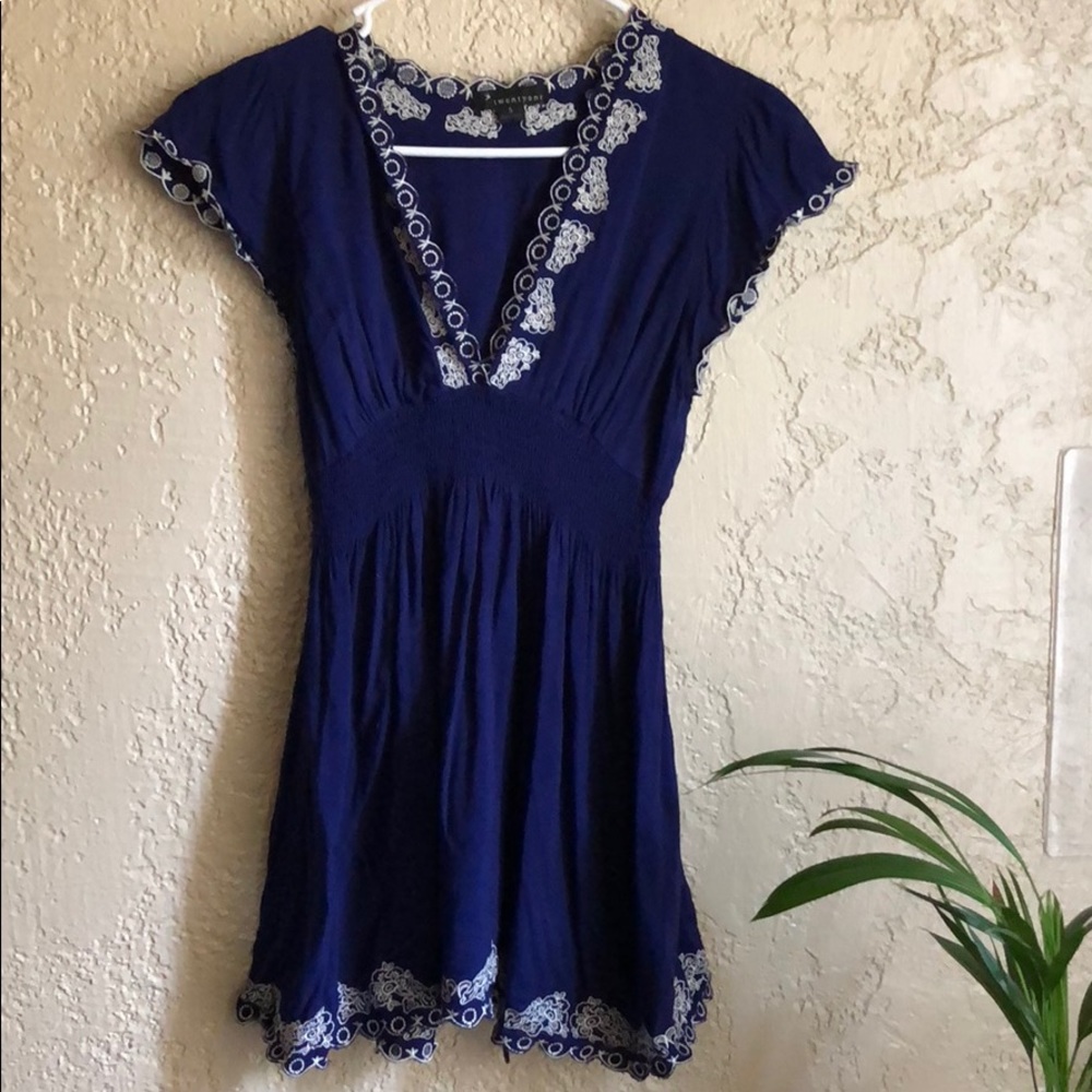 Blue top with white embodiment very cute!!